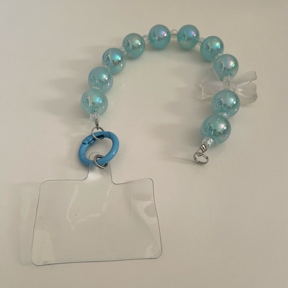 Large Blue Beaded with Clear Bow Charm Phone Accessory Wristlet with Phone Tab - Picture 11 of 15